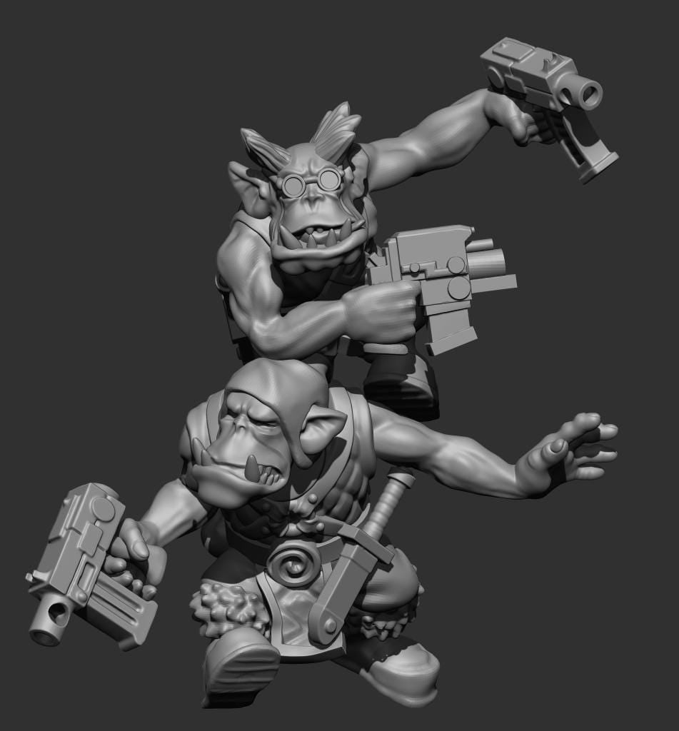 Guttertech Stackfire Goblins by Trollet Miniatures, a sci-fi resin goblin raider duo with one goblin perched on another while firing oversized pistols.