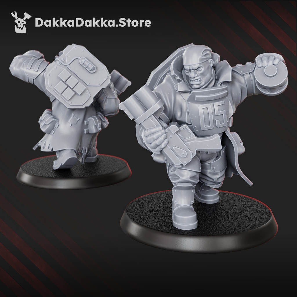 Alcat Heavy Mule miniature by DakkaDakka carrying a heavy weapon and shield, wearing goggles and rugged sci-fi armor.