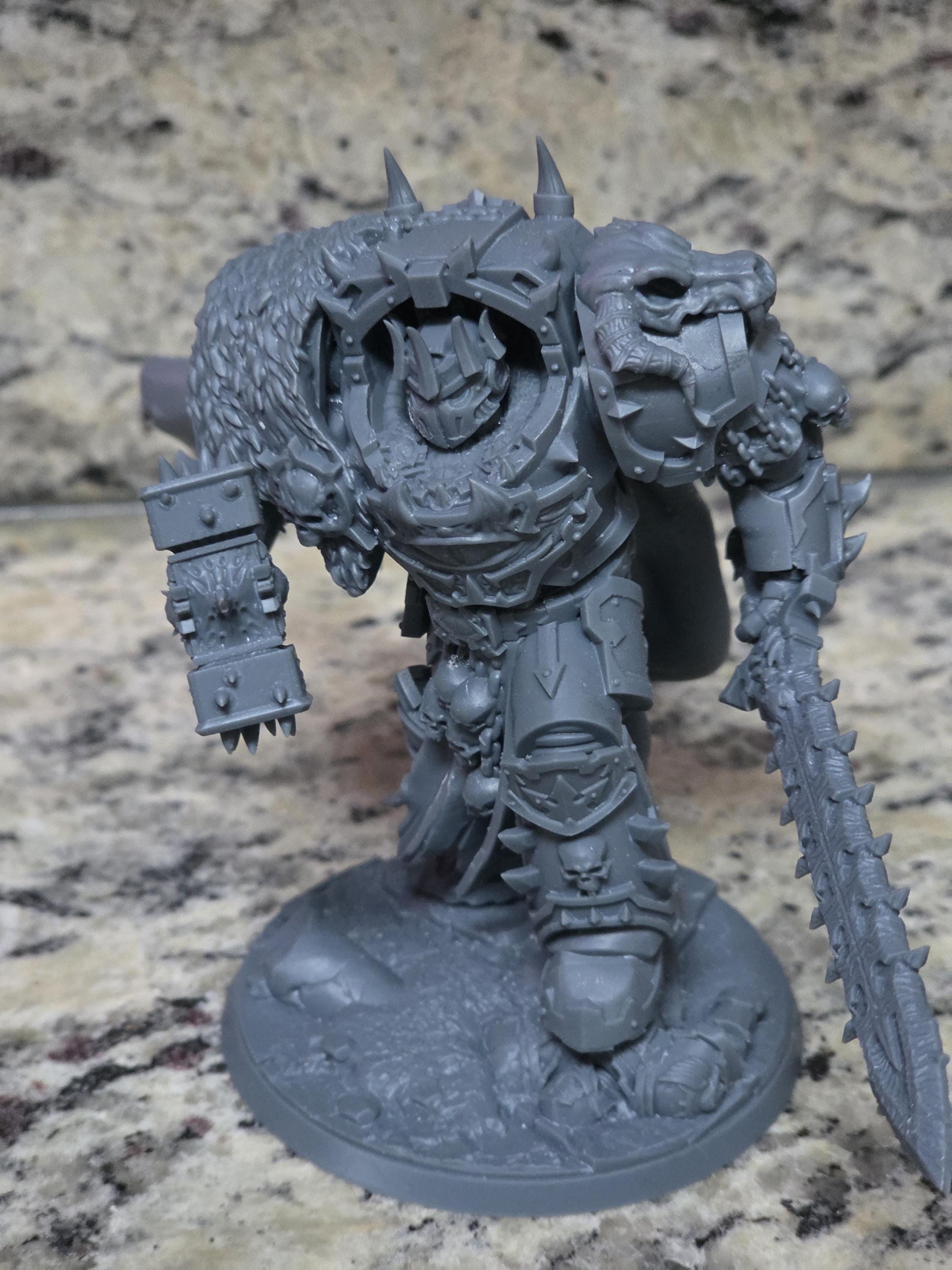 Close-up of the highly detailed resin armor, horns, and cape details on the Ammon the Traitor model kit.