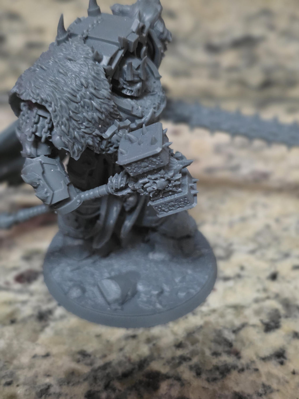 Close-up of the highly detailed resin armor, horns, and cape details on the Ammon the Traitor model kit.