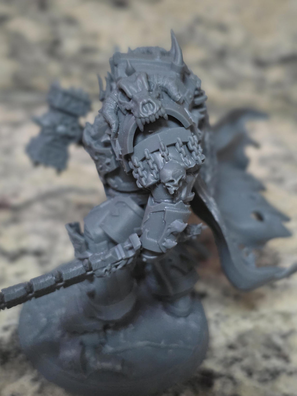 Close-up of the highly detailed resin armor, horns, and cape details on the Ammon the Traitor model kit.