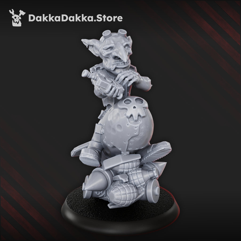 Bomb Goblin resin miniature by DakkaDakka, showing a goblin riding an oversized bomb with grenades, scrap details, and a skull-marked explosive casing.