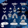 Unassembled resin components of Ghamak Cremetis Team kit — legs, chest, heads, arms, weapons, backpack, and shoulder pads