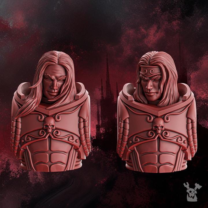 3D‑printed male character heads from the Crimson Wings set featuring detailed sci‑fi and fantasy‑style designs