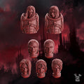 3D‑printed male character heads from the Crimson Wings set featuring detailed sci‑fi and fantasy‑style designs