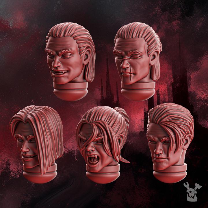 3D‑printed male character heads from the Crimson Wings set featuring detailed sci‑fi and fantasy‑style designs