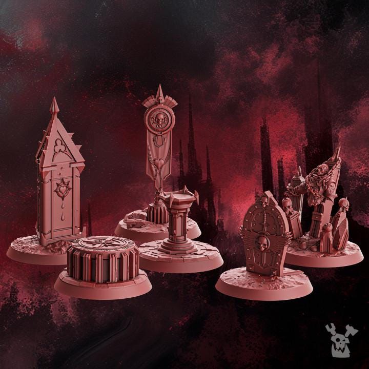 A collection of 3D‑printed Crimson Wings objective markers featuring detailed sci‑fi designs 