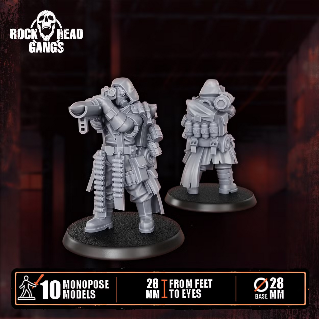 Close-up of two Deadland Lurkers resin miniatures with heavy weapons and industrial equipment