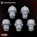 Five Doomsday Infantry head options by DakkaDakka, including helmeted, goggled, gas mask, and bare sci-fi soldier heads.