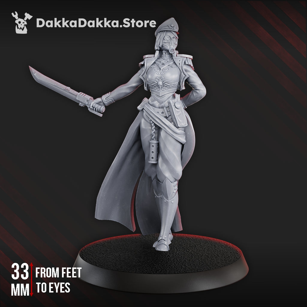 Female Commissar by DakkaDakka shown from the front with officer cap, ornate armor, long coat, and raised sword on a round base.