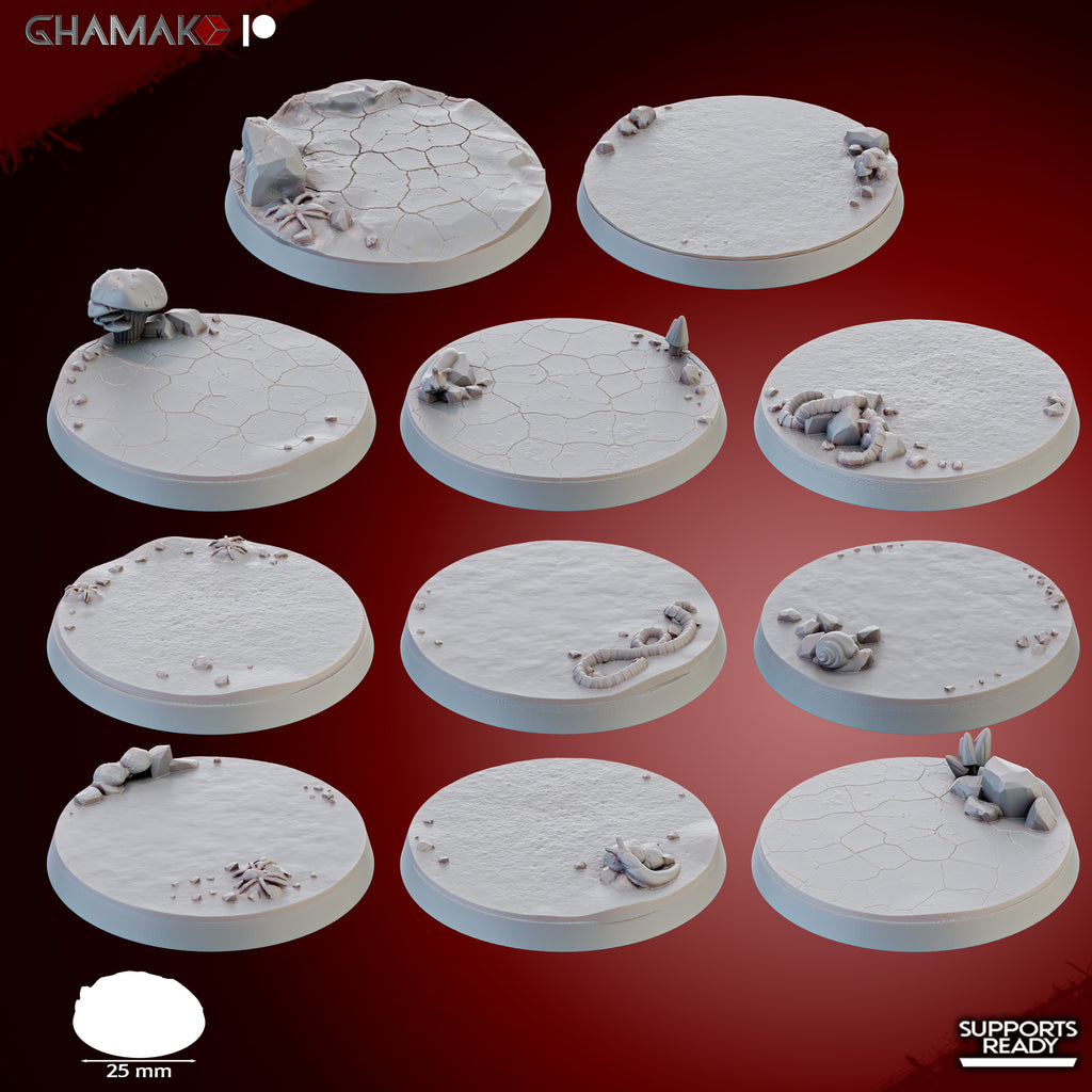 Set of 10 fungal wasteland 25mm resin scenic bases by Ghamak, showing cracked earth, mushrooms, rocks, shells, worms, crystals, and small terrain details.