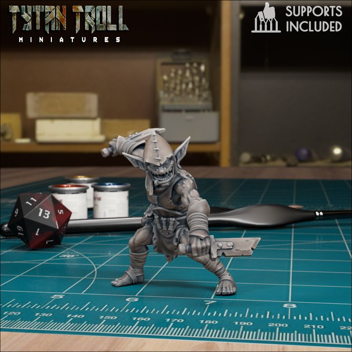 Goblin Assassin miniature by TytanTroll holding crude blades with a sneaky grin, perfect for fantasy RPG goblin ambushes and tabletop encounters.