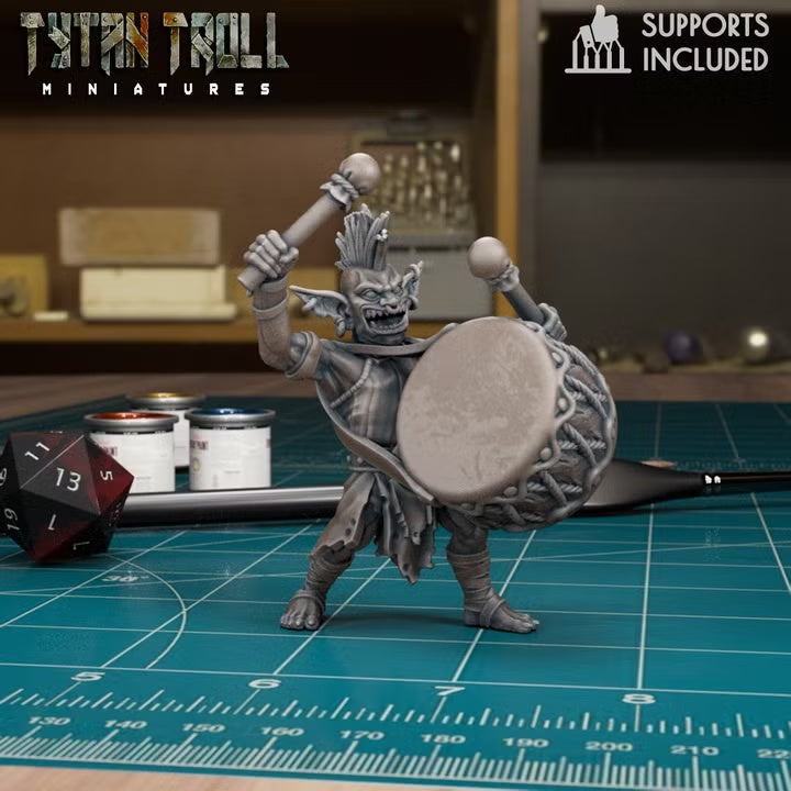 Standing goblin bard bass drummer with two mallets