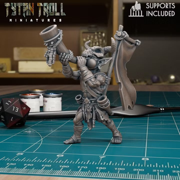 Goblin bard playing horn beside a banner