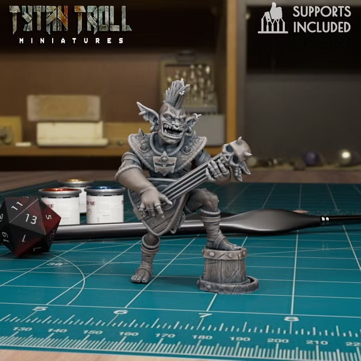 Standing goblin bard guitarist with foot on a barrel