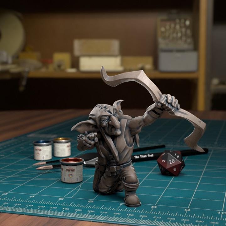 Resin 3D‑printed goblin raider miniature by TytanTroll holding a bow.