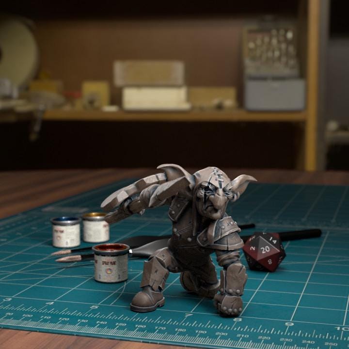 Resin 3D‑printed goblin raider miniature by TytanTroll holding a spear. 