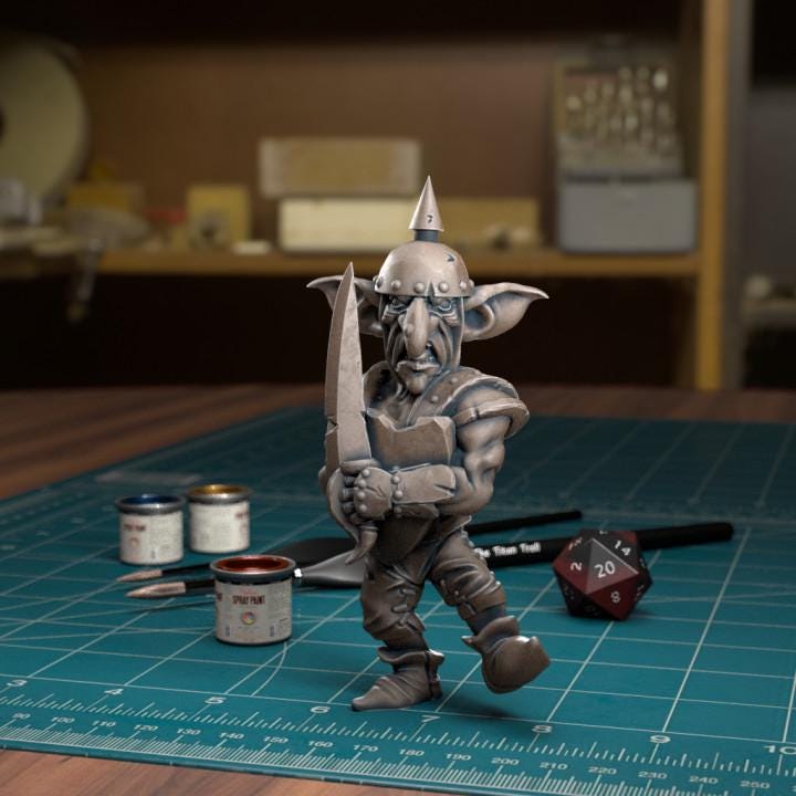 Resin 3D‑printed goblin raider miniature by TytanTroll holding an oversized curved blade. 