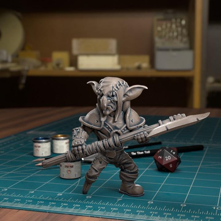 Resin 3D‑printed goblin raider miniature by TytanTroll holding a halbert. 
