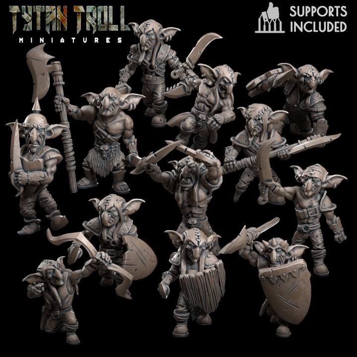 Group of resin 3D‑printed Goblin Raider miniatures by TytanTroll shown on a black background, featuring multiple goblins in dynamic poses with axes, curved blades, spears, shields, and armor.