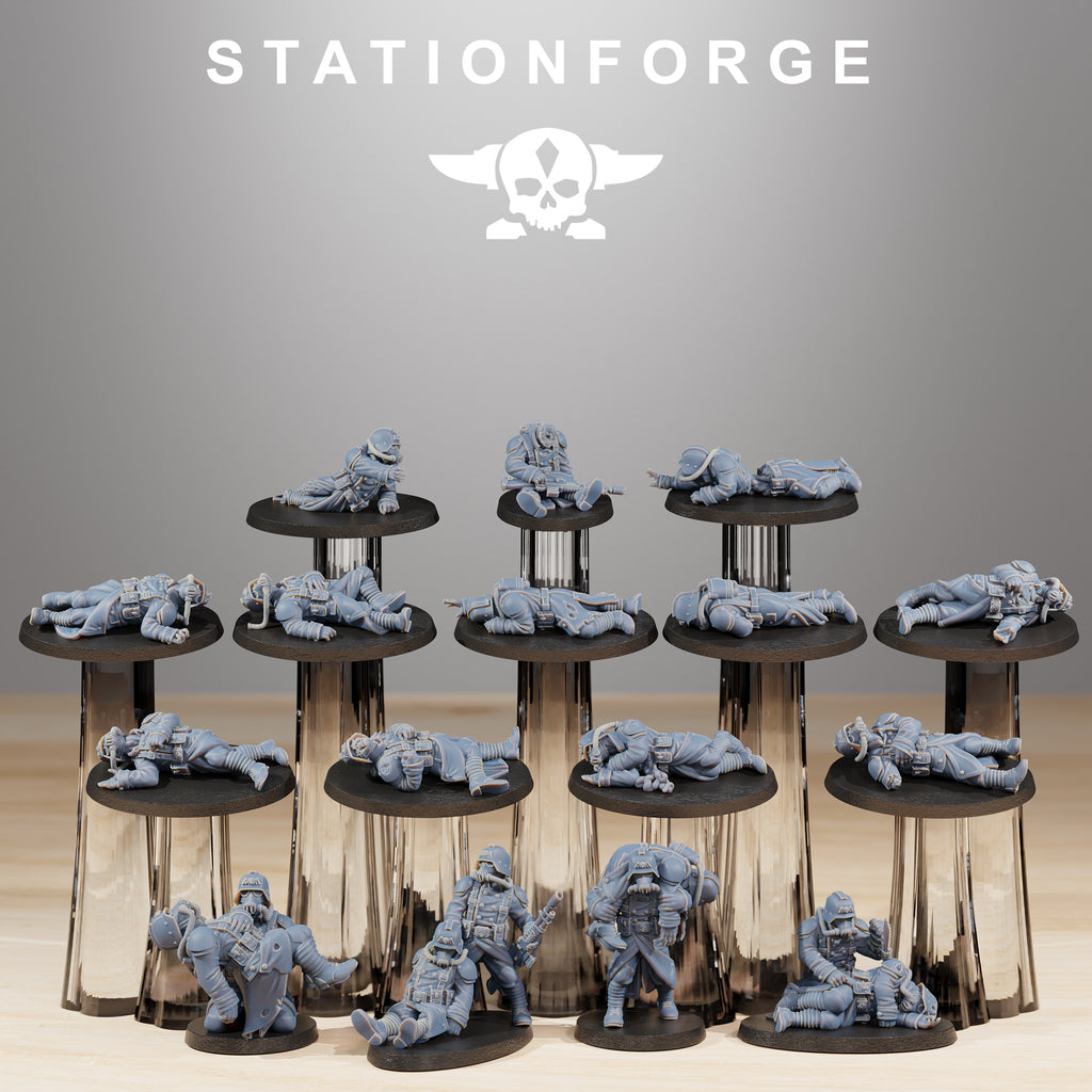GrimGuard The Fallen resin casualty marker set by StationForge featuring multiple fallen trench soldiers, wounded poses, rescue scenes, gas masks, armor, and grimdark battlefield details.