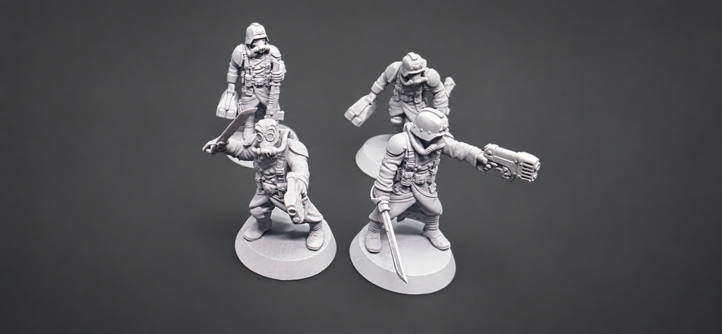 Four GrimGuard Infantry sergeant miniatures by StationForge with pistols, blades, gas masks, and command poses.