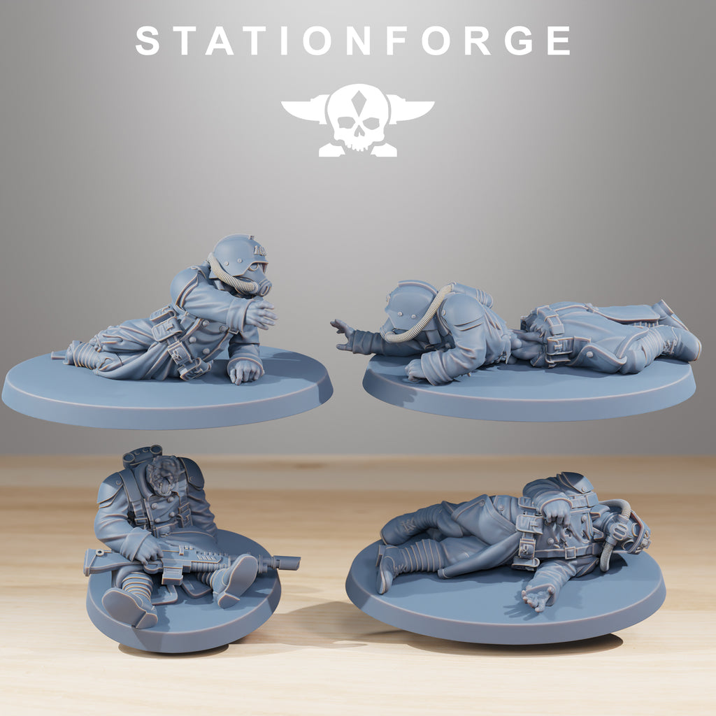 GrimGuard The Fallen resin miniatures showing four fallen sci-fi trench soldiers in different prone battlefield poses.