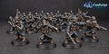 Painted GrimGuard Infantry squad of 20 by StationForge with gas masks, trench coats, rifles, special weapons, and melee gear.