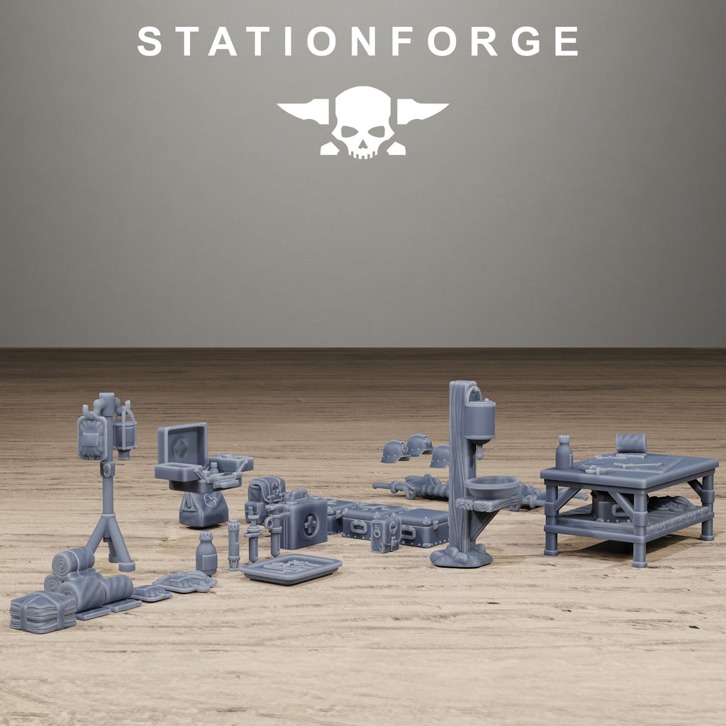 Station Forge Grimguard Medical Bits set displayed in a wide layout with medical tools, crates, supplies, helmets, and terrain accessories.