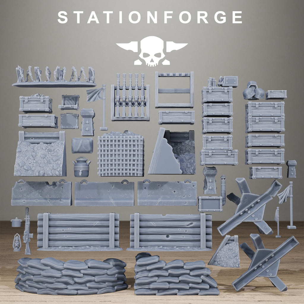 Grimguard War Terrain Bits resin scatter terrain set by Station Forge with crates, sandbags, barricades, tank traps, and battlefield accessories.