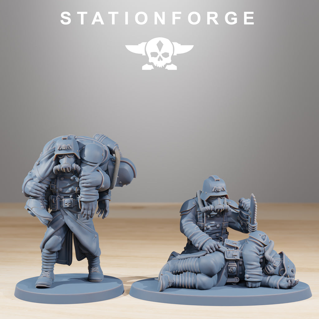 GrimGuard The Fallen resin miniatures by StationForge showing detailed casualty and recovery poses with grimdark sci-fi trench warfare styling.