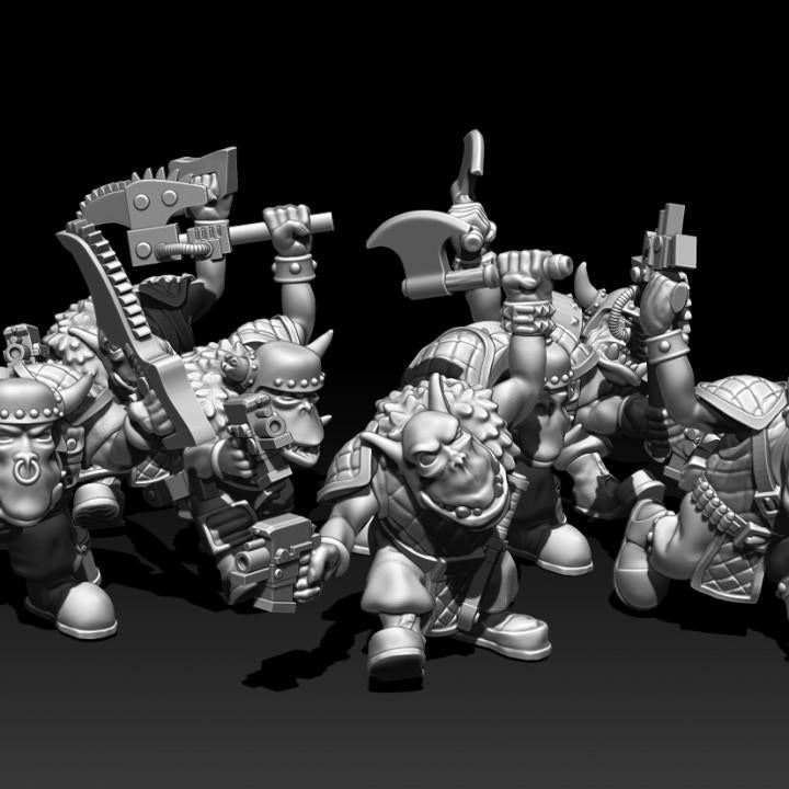 Group of 10 Guttertech Goblin Raider resin miniatures by Trollet Miniatures, featuring sci-fi goblin fighters with axes, blasters, goggles, helmets, and dynamic charging poses.