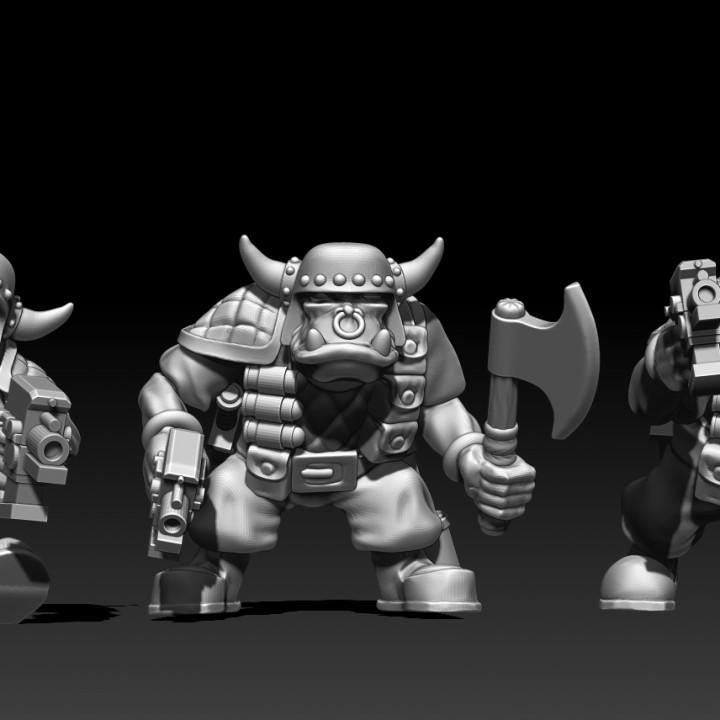 Close view of Guttertech Goblin Raider miniatures with goblin faces, armor plates, melee weapons, and compact sci-fi guns.