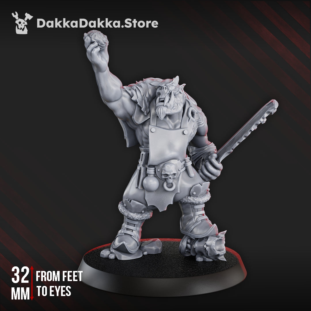 Heala Khan Kork miniature by DakkaDakka, showing a sci-fi orc medic character with raised hand, jagged blade, apron, skull details, and fur cloak.