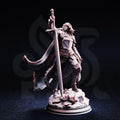 Jeanne du Lac human paladin miniature by DM Stash, holding a longsword upright on a rocky scenic base