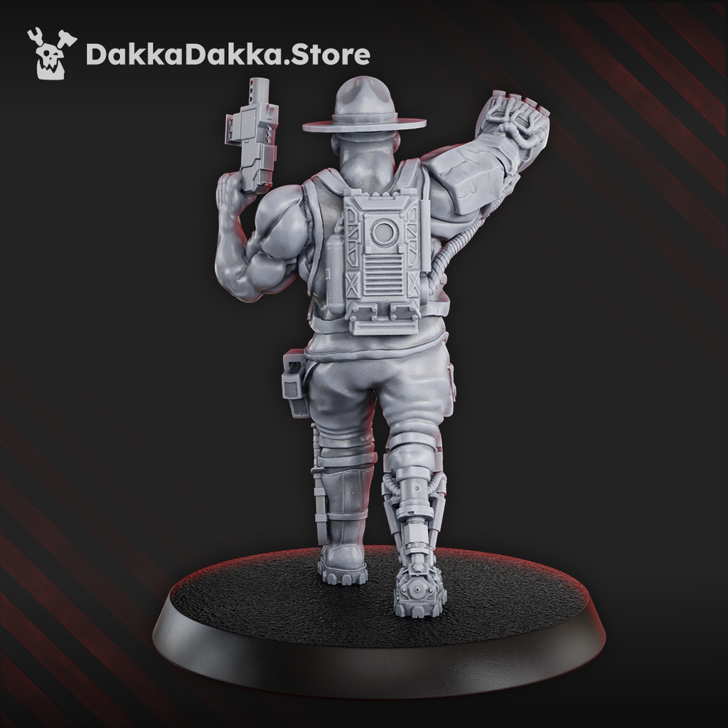 Rear view of Jungle Fighter Commander by DakkaDakka, showing backpack detail, flowing gear, bionic leg, raised pistol, and battlefield command pose.