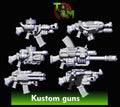 Six Scrapfire Gun Bits by Trollet Miniatures, showing chunky sci-fi resin weapon bits with heavy barrels, rivets, hoses, magazines, vents, and scrap-built conversion details.