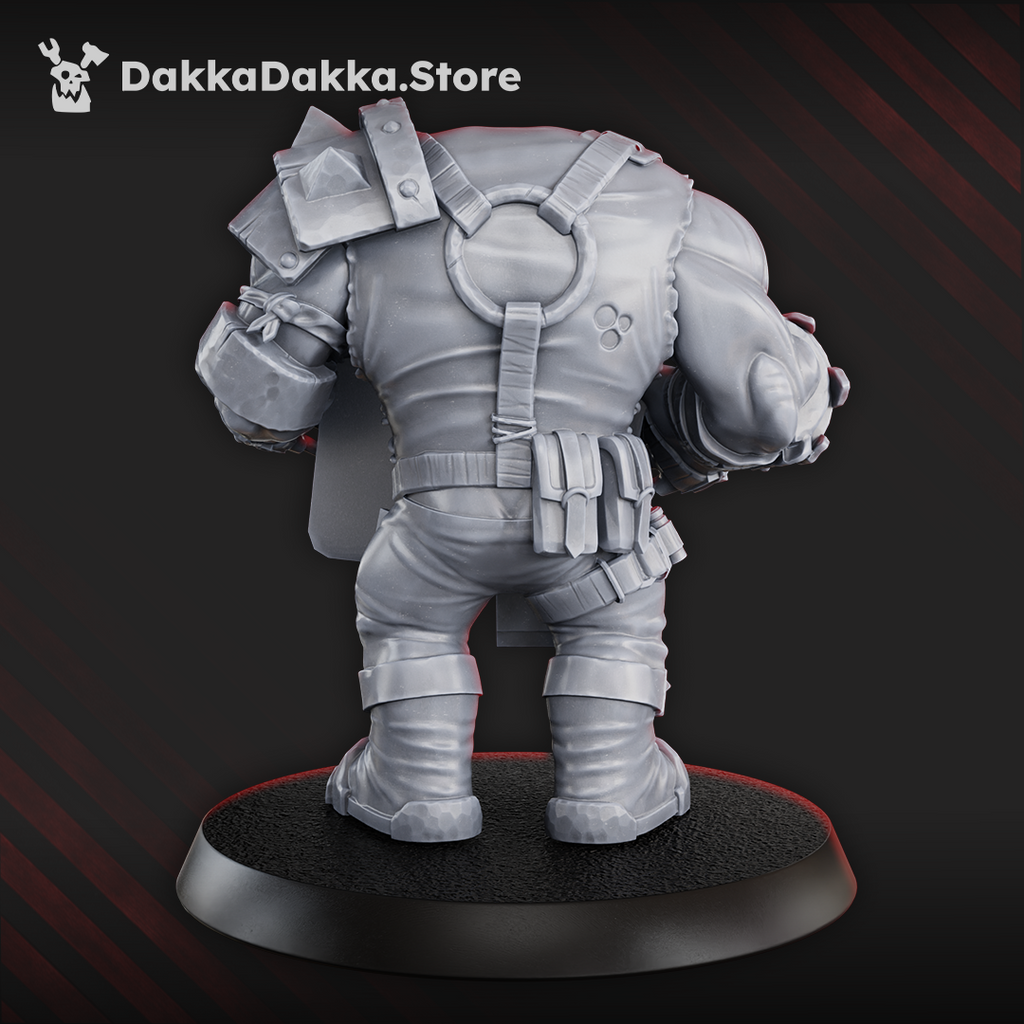 Rear view of Make WAAAGH! not War by DakkaDakka, showing the sci-fi orc miniature’s back straps, armor details, large sign shield, and rugged clothing sculpt.