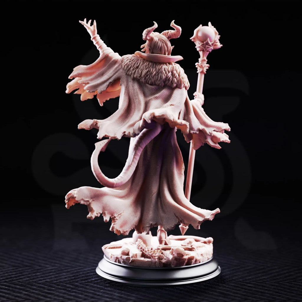 Rear view of Mallory the Envious showing the detailed cloak, tail, staff, and sculpted fantasy armor.