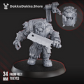 Medic Boy by DakkaDakka, a sci-fi orc medic resin miniature with a cleaver, mechanical backpack rig, armored gear, and oversized battlefield surgery tools.