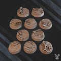 Set of 10 muddy battlefield resin bases by DakkaDakka, showing rough ground, broken planks, pipes, and sci-fi debris for tabletop miniatures.