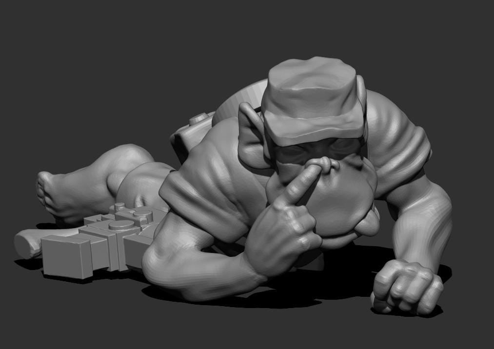 Resin 3D‑printed Guttertech Stackfire Goblin miniature by Trollet, showing a crawling goblin‑style raider in a cap, reaching forward with one hand while touching the face with the other, with blocky sci‑fi gear beside the figure.