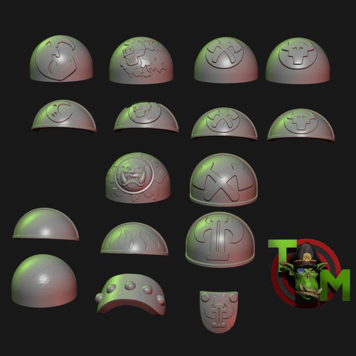Guttertech Brute shoulder pad bits by Trollet Miniatures, showing assorted sci-fi resin armor plates with carved symbols, rivets, skull details, and scrap-style designs.