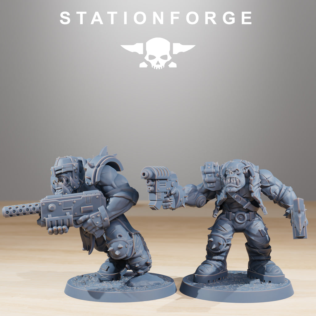 Two Orkaz Infantry miniatures by Station Forge, shown with rifle and pistol weapons, rugged armor, and dynamic sci-fi raider poses.