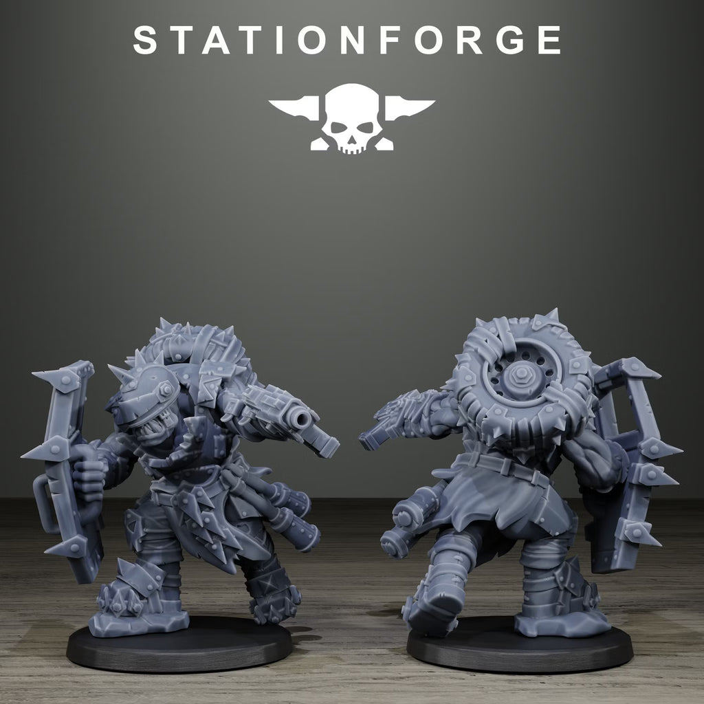 Orkaz Scrappers modular squad miniature close-up, with a shield and pistol and a tire strapped to his back