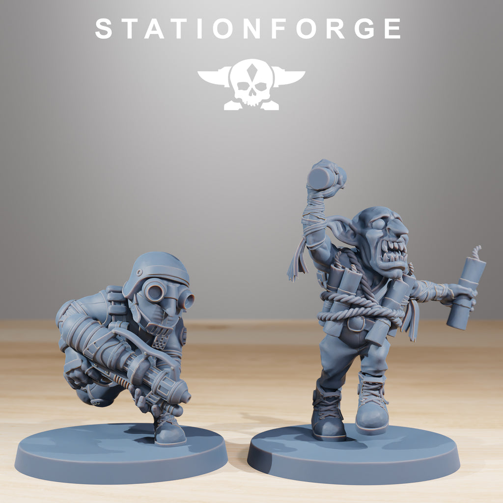 Two goblin helper miniatures from the Orkaz Skillers set by Station Forge, shown with utility gear and explosive accessories.