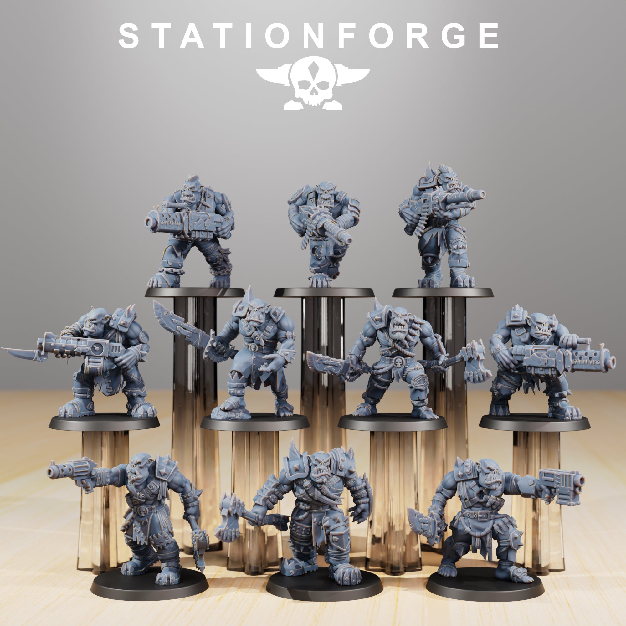 Full Orkaz Strappaz squad by Station Forge showing 10 modular sci-fi greenskin miniatures with heavy weapons, axes, armor, and varied poses.