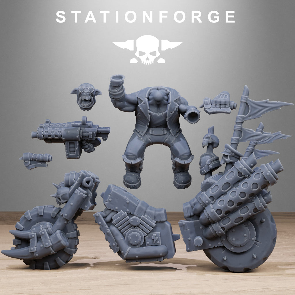 Orkaz Biker modular parts by Station Forge, showing bike frame, wheels, weapons, rider body, head, arms, banners, and resin build components.