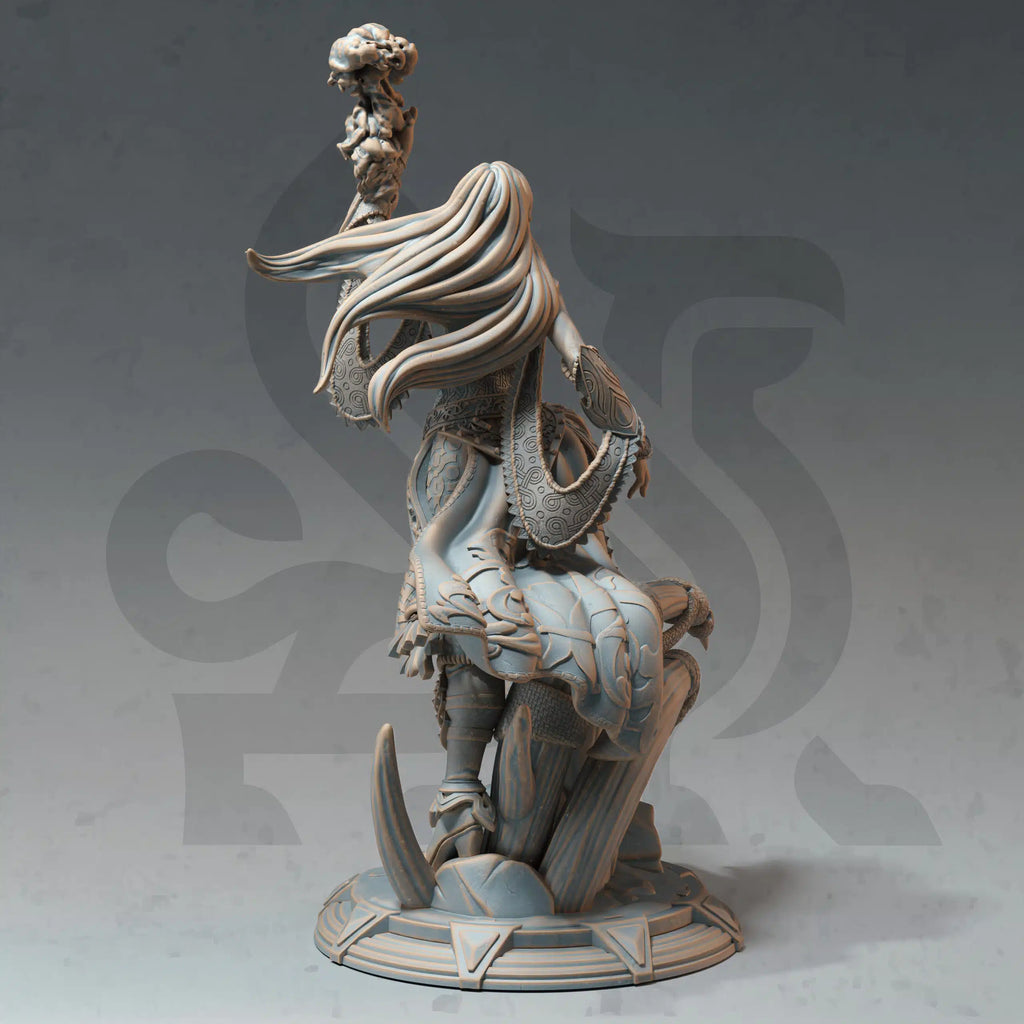 Rear view of Orstina of Havenmond Professor of Transference miniature, showing flowing hair, shield, armor details, and scenic base.