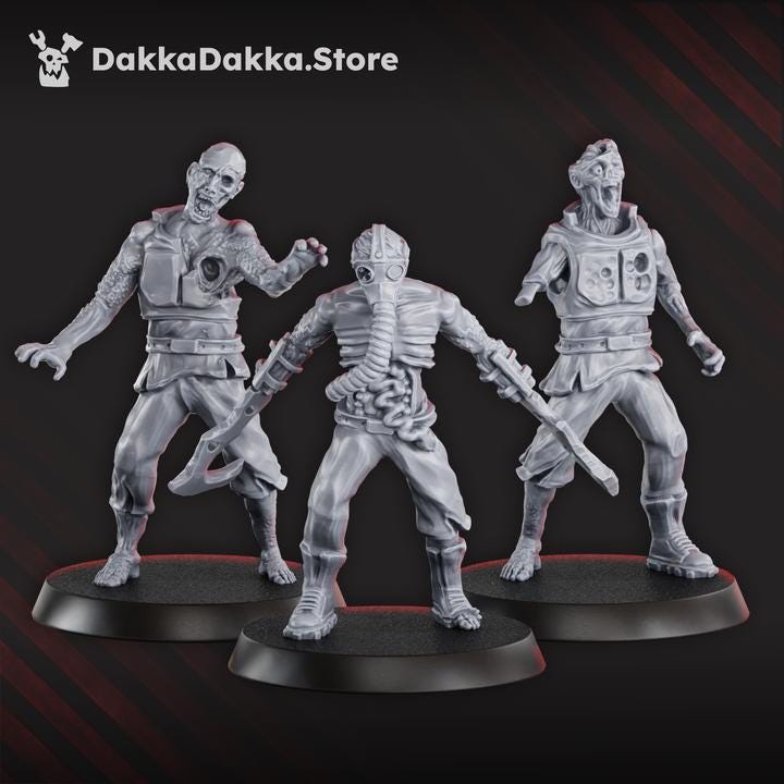 Three unpainted Pandemic Zombies miniatures showing damaged armor, survivor gear, and varied undead poses.